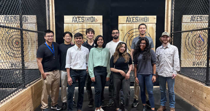 participants of the ATCS internship program taking group photo at axe throwing social event