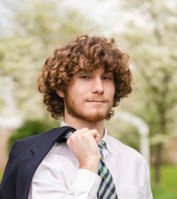 Headshot of Elijah Poitras