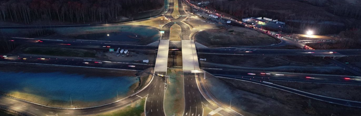 aerial view of highway interchange at night