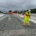 A worker in safety gear working on preparation for concrete pouring construction efforts.