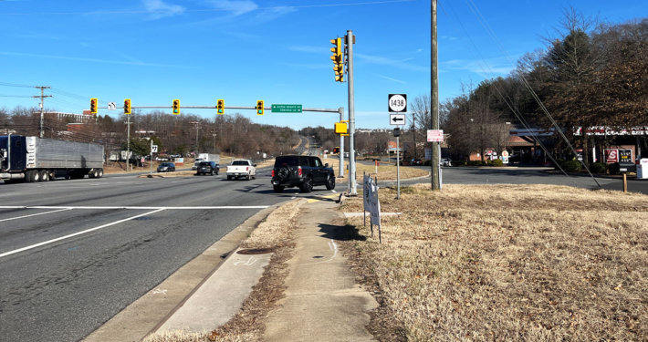 sidewalk in disrepair alongside highway