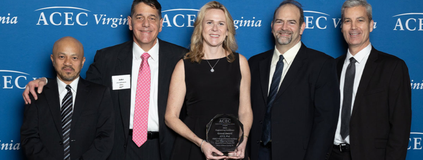 ATCS team holding glass award at the ACEC VA 2024 Engineering Excellence Award Gala